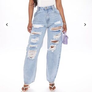 Woman’s Never Let Go Distressed Boyfriend Jeans.